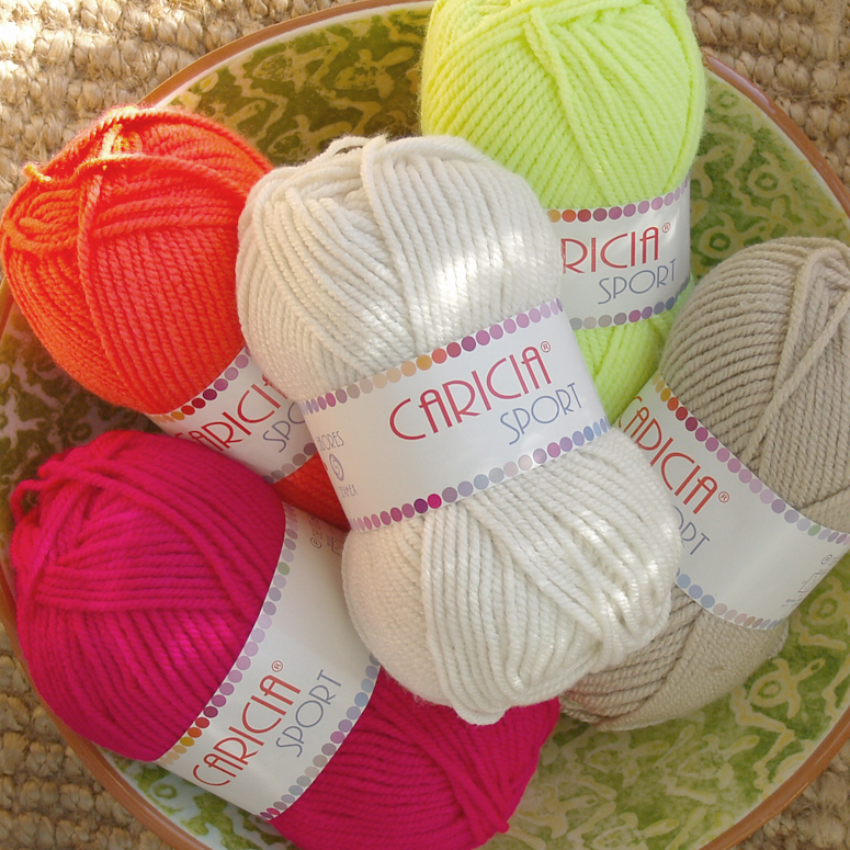 Materiales: ovillos lana Caricia Sport, agujas tricotar y aguja lanera