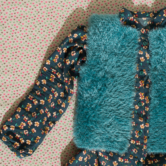 Look con chaleco pelo niña